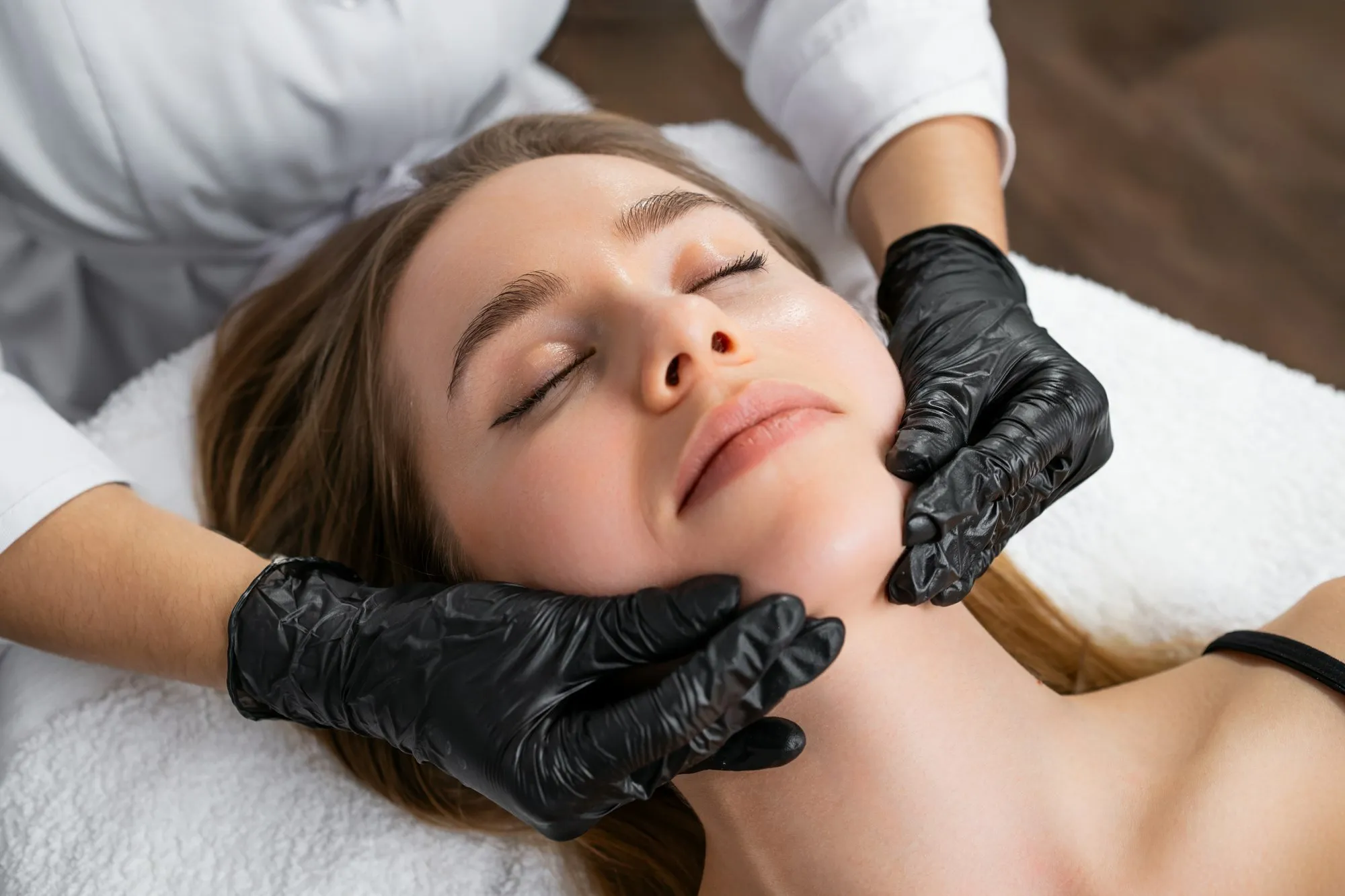 Facial massage with collagen cream